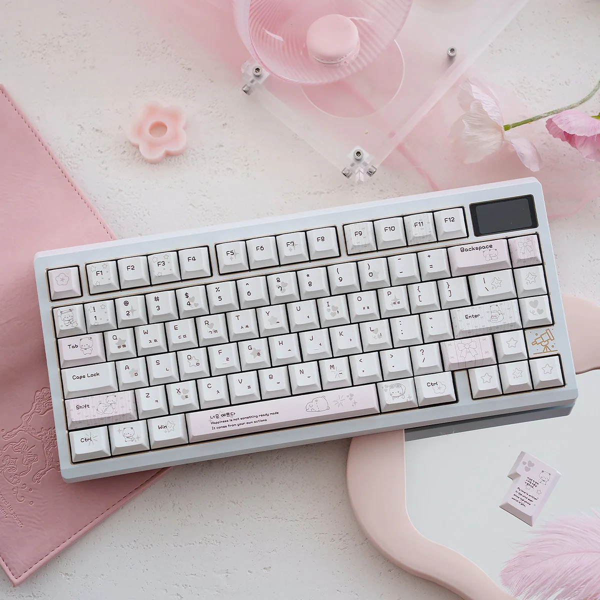 A captivating display of unique Yier Bubu keycaps set, showcasing whimsical PBT dye-sublimated art with vibrant, long-lasting legends.