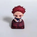 Exclusive 3D Yuji Itadori keycap from Jujutsu Kaisen, vibrantly sculpted in premium resin, showcasing its dynamic anime aesthetic from various angles.