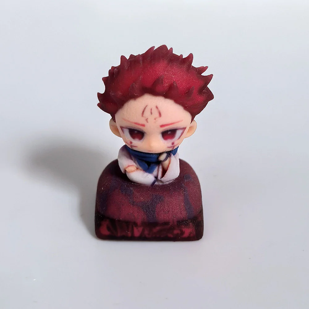 Exclusive 3D Yuji Itadori keycap from Jujutsu Kaisen, vibrantly sculpted in premium resin, showcasing its dynamic anime aesthetic from various angles.