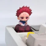 Exclusive 3D Yuji Itadori keycap, part of the Jujutsu Kaisen collection, vividly sculpted from premium resin and shown from multiple dynamic angles.