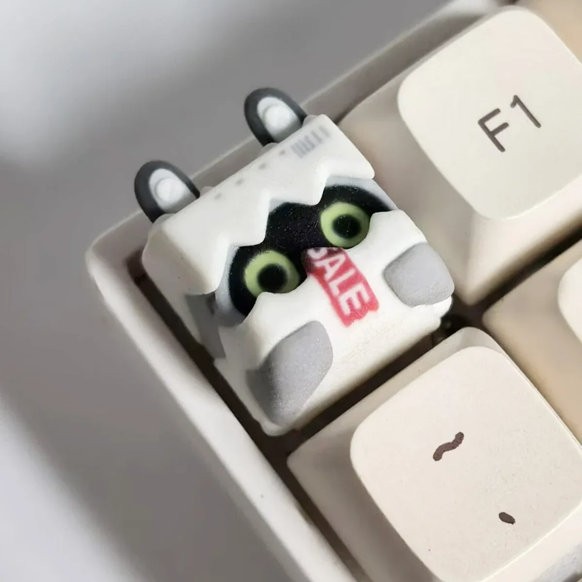 A detailed side view of the handcrafted Zenless Zone Zero Bangboo artisan keycap, highlighting its vibrant 3D sculpt and game-accurate details.