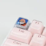 Exclusive Zero Two Keycap: DARLING in the FRANXX premium artisan, showcasing its vibrant pink/red anime aesthetic from a distinct angle.