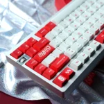 Close-up of the 1950s Championship Dye-Sub PBT Keycap Set, showcasing its vintage fonts, classic colors, and retro aesthetic from multiple angles.