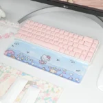 Multiple delightful angles of the adorable Hello Kitty wrist rest, showcasing its whimsical design, vibrant colors, and ergonomic curve for playful comfort.