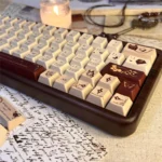 Antiquing Love Letter PBT keycaps displayed from multiple angles, highlighting their unique vintage aesthetic and aged, romantic design.