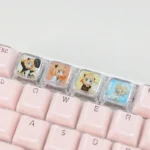 Playful Anya Transparent Keycap from SPY x FAMILY, captured at a unique angle, highlighting its iconic anime design and clear resin finish.