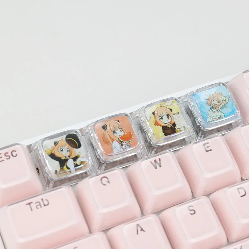 Playful Anya Transparent Keycap featuring iconic SPY x FAMILY art, a vibrant and unique collectible crafted from clear resin.