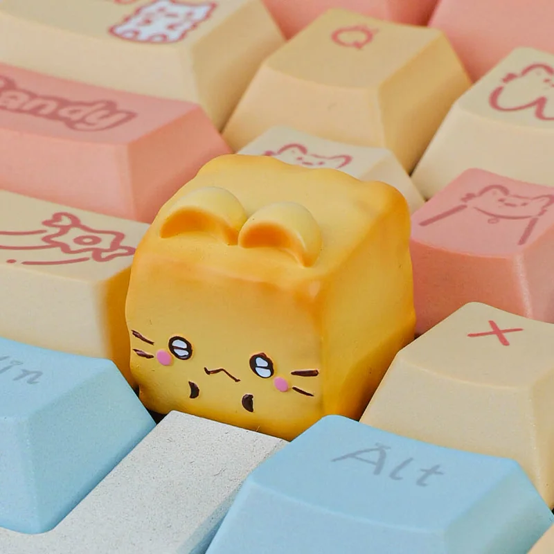 Whimsical Cat Oden resin artisan keycap, meticulously handcrafted, showcasing its adorable food theme from a charming side angle.