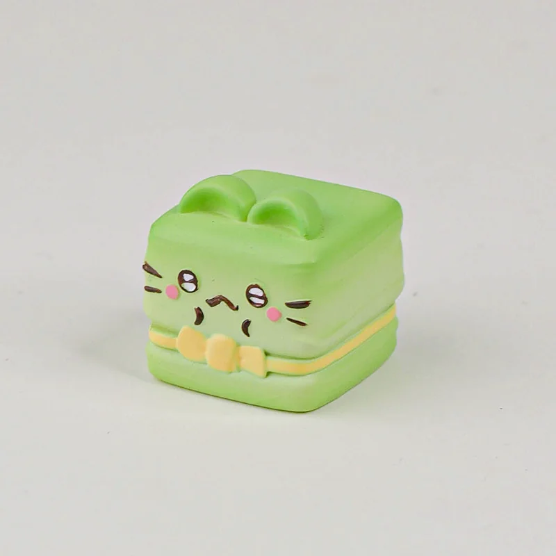 A whimsical handcrafted resin Cat Oden artisan keycap, showcased from a charming side angle, highlighting its adorable miniature food details.