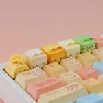 Handcrafted whimsical Cat Oden resin artisan keycap, featuring adorable miniature food art with vibrant, charming details for enthusiasts.