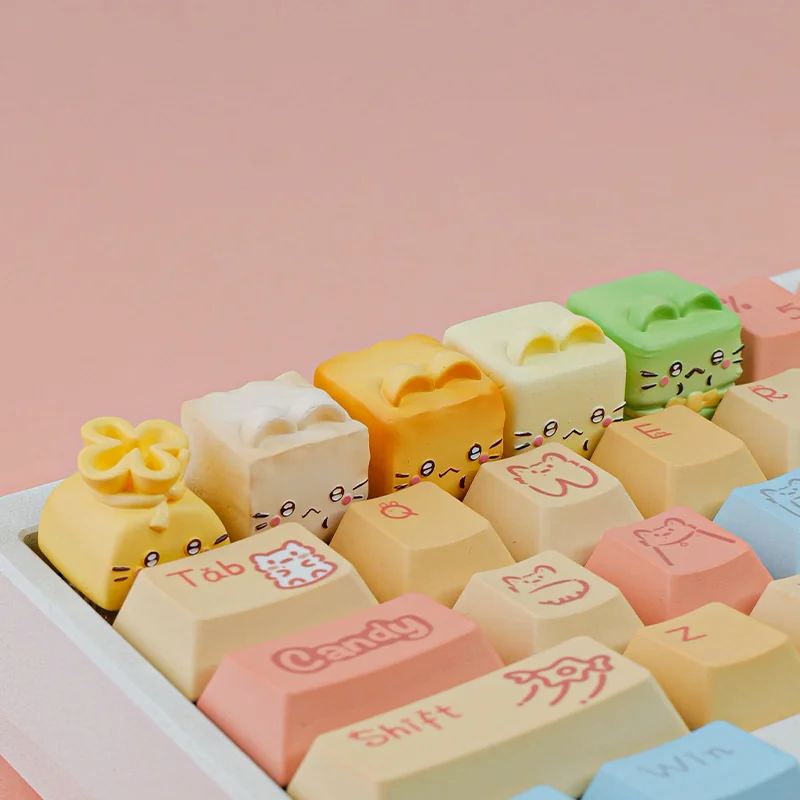 Handcrafted whimsical Cat Oden resin artisan keycap, featuring adorable miniature food art with vibrant, charming details for enthusiasts.