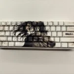 Exclusive Eren Yeager Attack Titan PBT keycaps set, highlighting the dark aesthetic, side-printed legends, and minimalist design from various premium design.