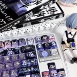 Close-up of an exclusive Black Butler PBT 126-Keycap Set, showcasing intricate Gothic Victorian art of Ciel and Sebastian on individual keycaps, highlighting their details.