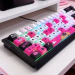 Close-up views of the unique side-engraved Black Pink Dragon PBT keycaps set, showcasing the mystical dragon motif and modern black and pink aesthetic.