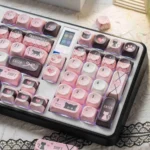 Sweetheart black pink cat PBT MOA keycaps set, showcasing adorable black feline motifs and crisp dye-sub legends from various playful angles.