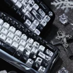 Black Requiem PBT keycap set, viewed from multiple angles. Reveals its dark, solemn, dramatic gothic elegance and intricate premium details for keyboard.