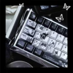 Black Requiem PBT keycap set from various angles, highlighting its dark, solemn, and elegant design. Intricate gothic details define this premium keyboard.