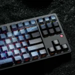 Stunning Blue Galaxy Keycaps, showing their deep blue cosmic gradient and ethereal light refraction from multiple angles.