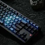 Stunning Blue Galaxy Keycaps with blue cosmic gradient, ethereal light refraction, creating a captivating premium artistic.