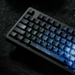 Gallery views of stunning Blue Galaxy Keycaps, highlighting the deep blue cosmic gradient and ethereal light refraction from various angles.