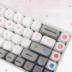 Bubble Bobble MOA keycaps in vibrant pink, with iconic retro gaming characters and playful bubbly aesthetics. Ideal for arcade nostalgia.