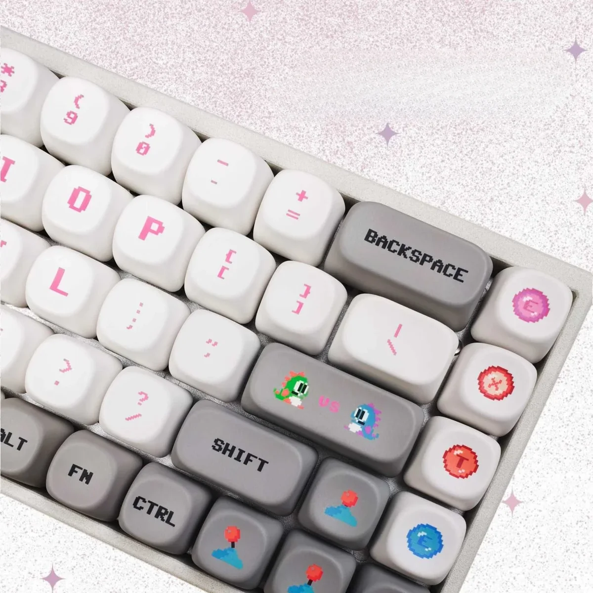 Bubble Bobble MOA keycaps in vibrant pink, with iconic retro gaming characters and playful bubbly aesthetics. Ideal for arcade nostalgia.