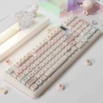 Overhead view of the Bunny Dessert Party PBT MOA keycaps, showing off their playful pastel designs and unique MOA profile.