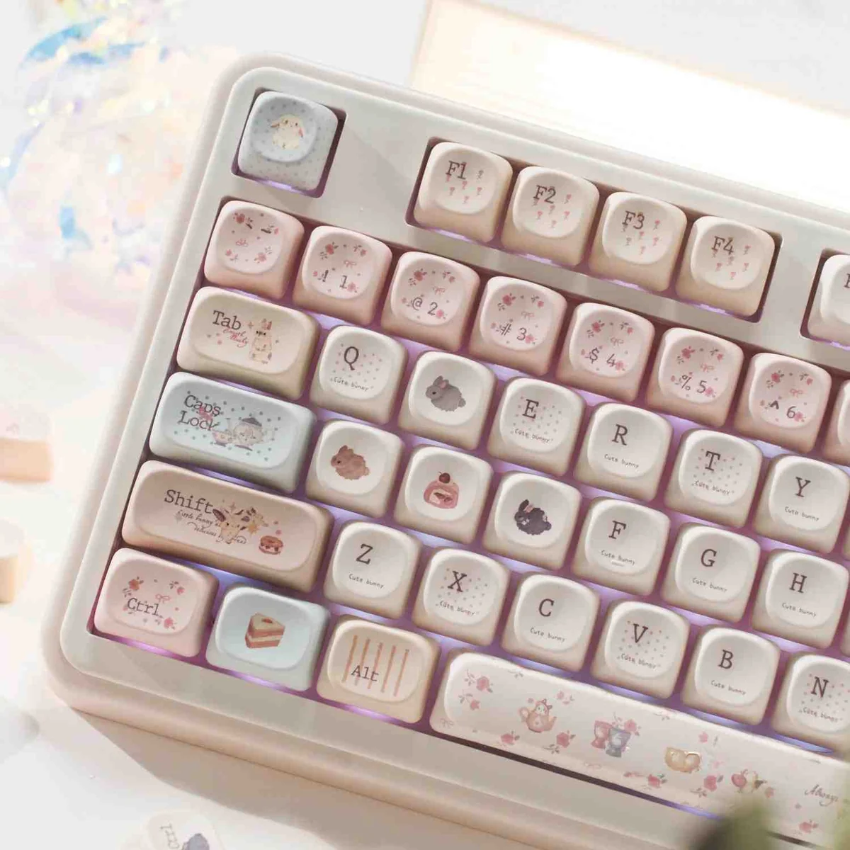 Close-up of bunny dessert PBT MOA keycaps set, featuring charming pastel bunnies and sweet treats from various playful angles.
