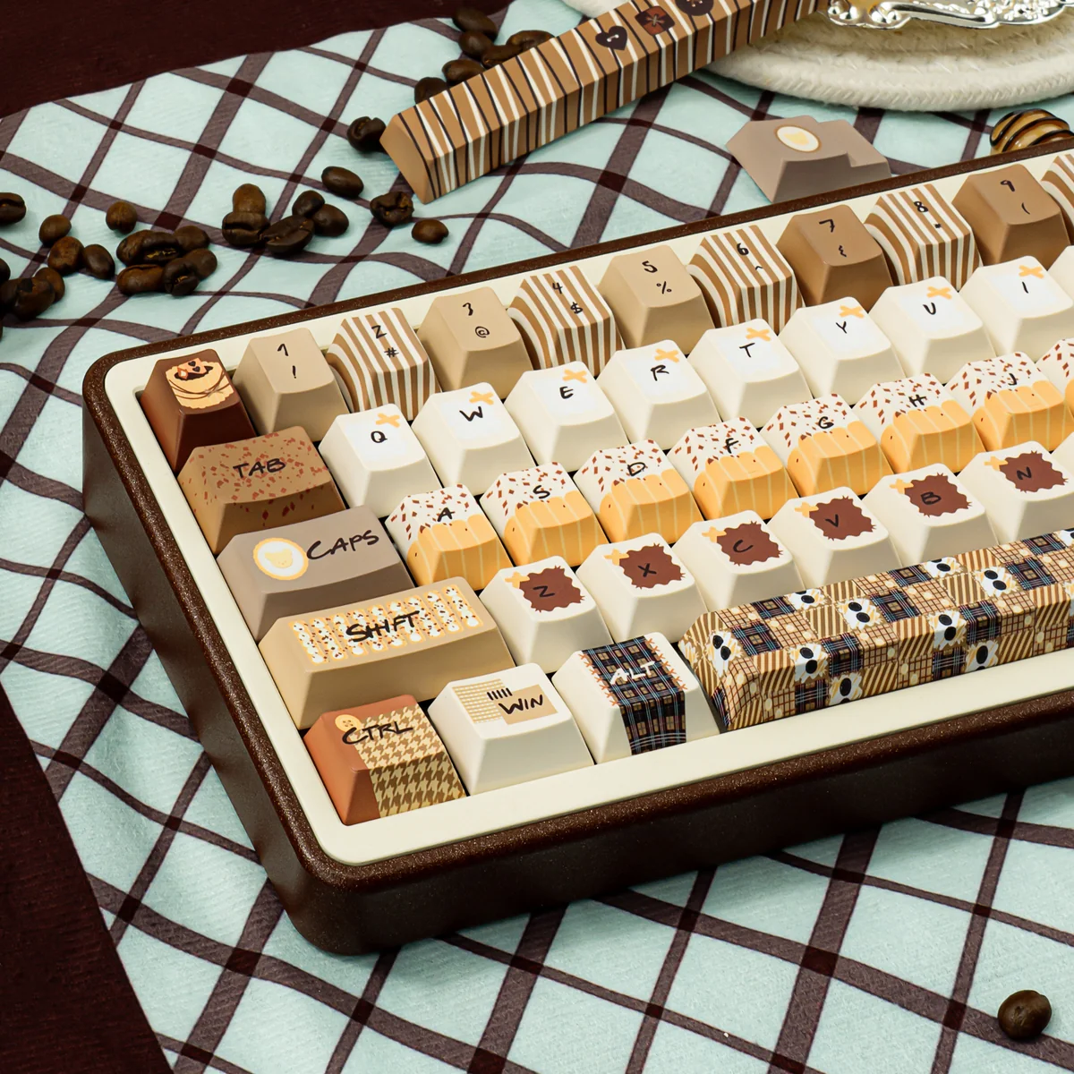 Indulgent Tiramisu Keycaps, PBT dye-sub, showcasing warm coffee, cream, and cocoa tones. Multiple angles highlight its delightful, cozy keyboard aesthetic.