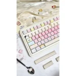 Whimsical Cat Squad PBT Dye-Sub Cat Keycaps Set, showcasing vibrant feline illustrations and durable dye-sublimation. Various angles highlight ergonomic design.