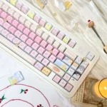 Whimsical Cat Squad PBT dye-sub cat keycaps set, showing vibrant feline illustrations, durable COA profile, and whimsical design from various angles.