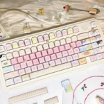 Whimsical Cat Squad PBT dye-sub cat keycaps set featuring charming, vibrant feline illustrations, showcasing the durable finish.