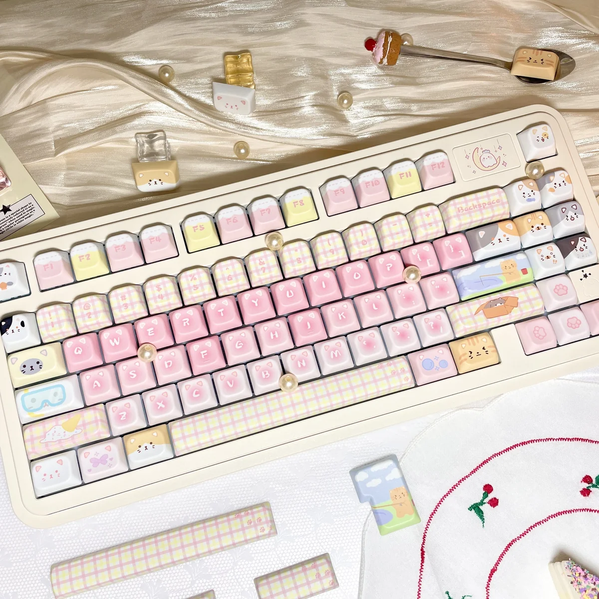 Whimsical Cat Squad PBT dye-sub cat keycaps set featuring charming, vibrant feline illustrations, showcasing the durable finish.