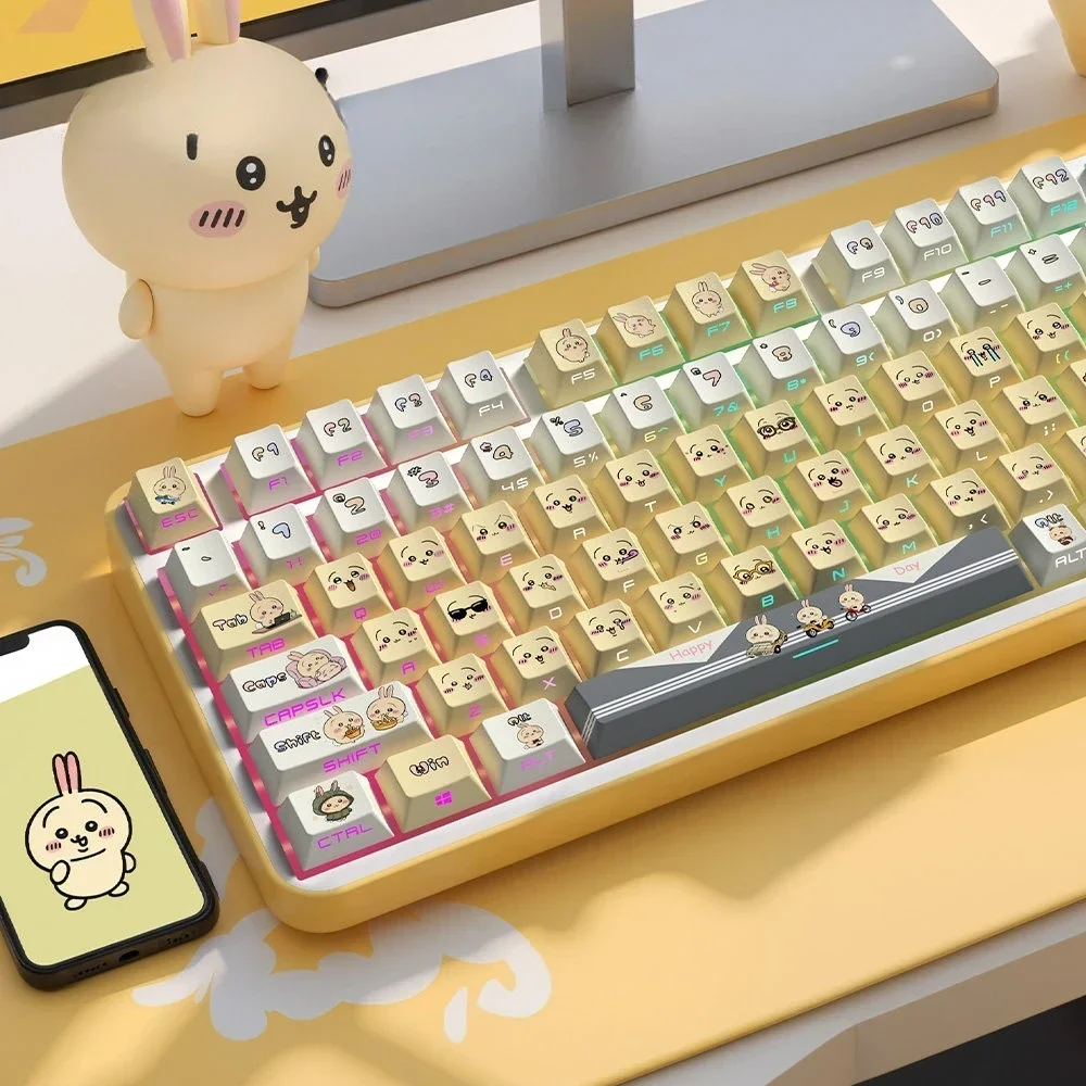 Charming Chiikawa Usagi PBT side-engraved keycaps set. Whimsical Usagi designs, minimalist legends shown from various angles.