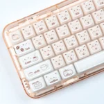 Handcrafted whimsical coffee kitten jelly artisan keycap set, captured from a charming angle, revealing its playful design and crystal jelly design.