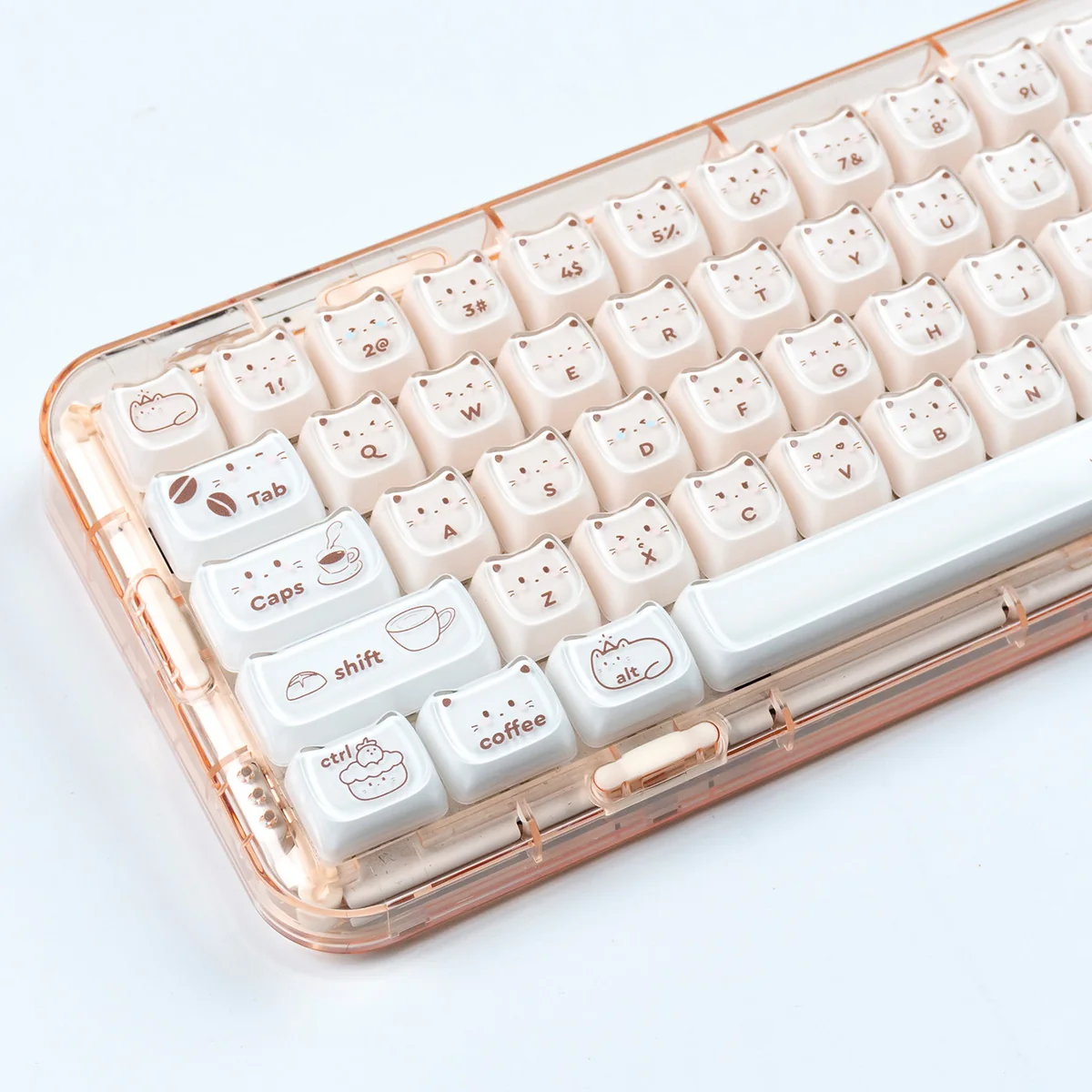 Close-up views of a whimsical handcrafted coffee kitten jelly artisan keycap set, showcasing its intricate design from various playful setup.