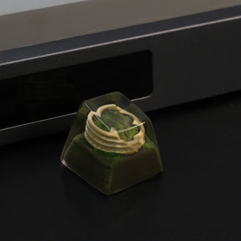 Multiple views of the handcrafted resin Colosseum artisan keycap, revealing its intricate miniature Roman ruins and sculptural details, evoking ancient design.