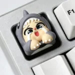Whimsical Crying Baby artisan resin keycap showcasing a unique goldfish design, meticulously handcrafted for a charming keyboard.