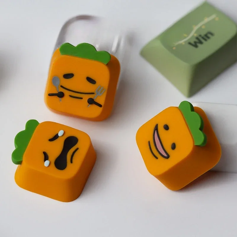 Handcrafted resin Cynical Carrot Tanaka keycaps with whimsical expressions, detailed from multiple angles. Vibrant and unique, these pieces add personality to any keyboard's artistic flair.