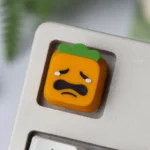 Gallery of handcrafted Cynical Carrot Tanaka keycaps, showcasing vibrant resin and detailed character designs from multiple artistic angles.