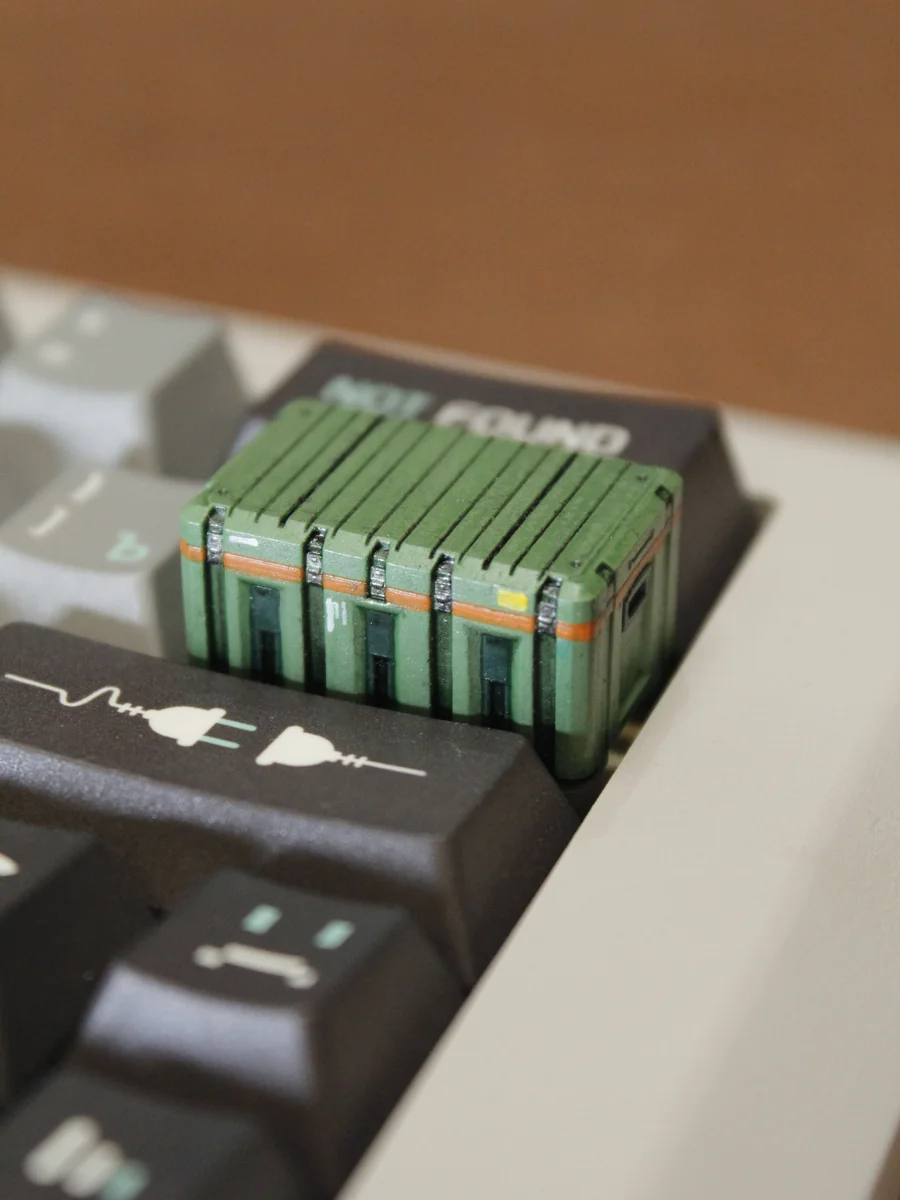 Premium Delta Force keycap showcasing an authentic, highly detailed weapon crate design with a rugged military aesthetic for tactical precision.