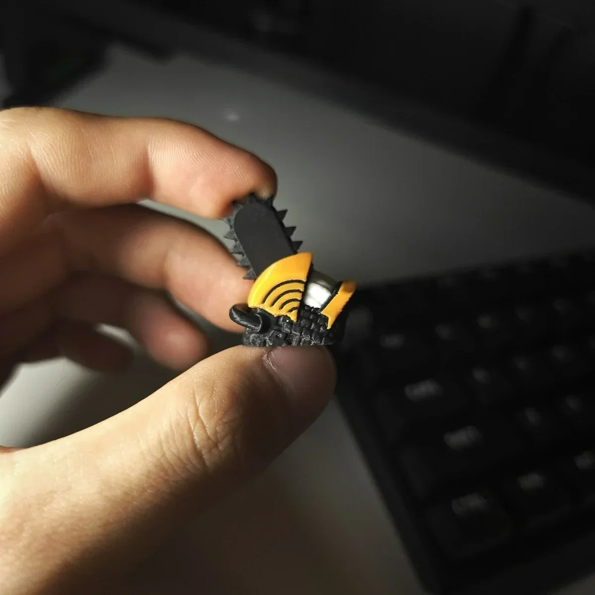 Detailed view of the handcrafted Denji Chainsaw Man collectible keycap, showcasing its vibrant 3D printed art from a unique angle.
