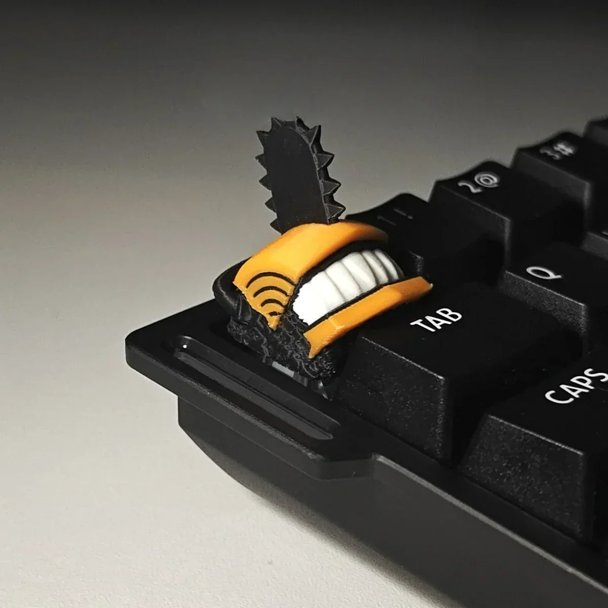 Vibrant, handcrafted Denji Chainsaw Man collectible keycap, showcasing intricate 3D printed anime art. A bold, artistic statement for any desk setup.