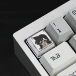 Handcrafted Detective Conan resin artisan keycap. Intricate details of vibrant anime characters are showcased from various artistic perspectives.