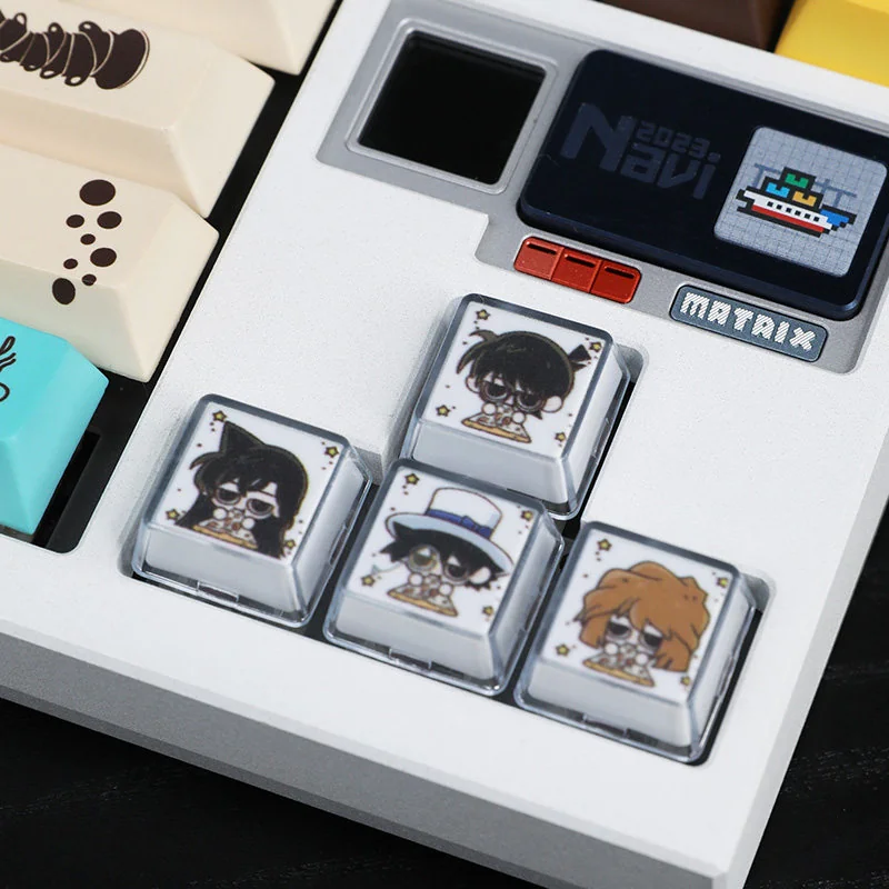 Handcrafted Detective Conan resin artisan keycaps, showcasing iconic characters and symbols from multiple angles. Intricate details and vibrant anime design.
