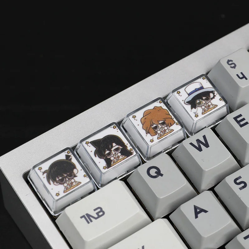 Handcrafted Detective Conan resin artisan keycaps from various angles, showcasing vibrant, intricate iconic designs for an artistic aesthetic.