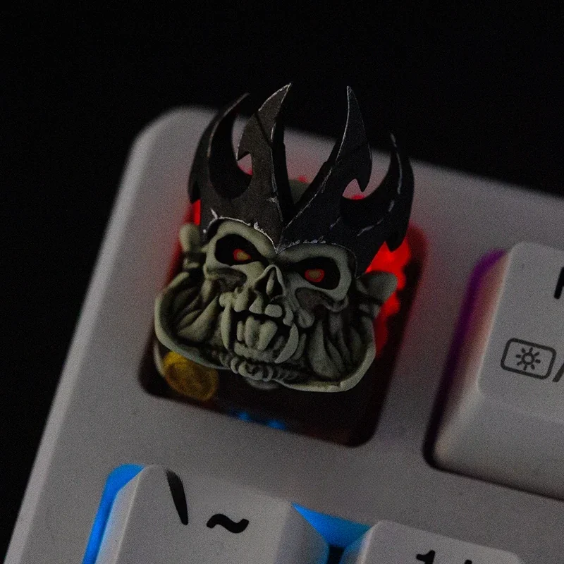 A close-up, artistic view of the DOTA 2 Skeleton King artisan keycap, showcasing its intricate dark fantasy resin details from a unique angle.