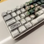 Vibrant Dragon Ball Z Shenron Goku side-printed PBT keycaps set. Playful character art and unique legends, viewed from multiple angles.