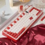 A playful full set of cute red emoticon PBT keycaps in MOA profile, showcasing various charming kaomoji and heart designs from multiple angles.
