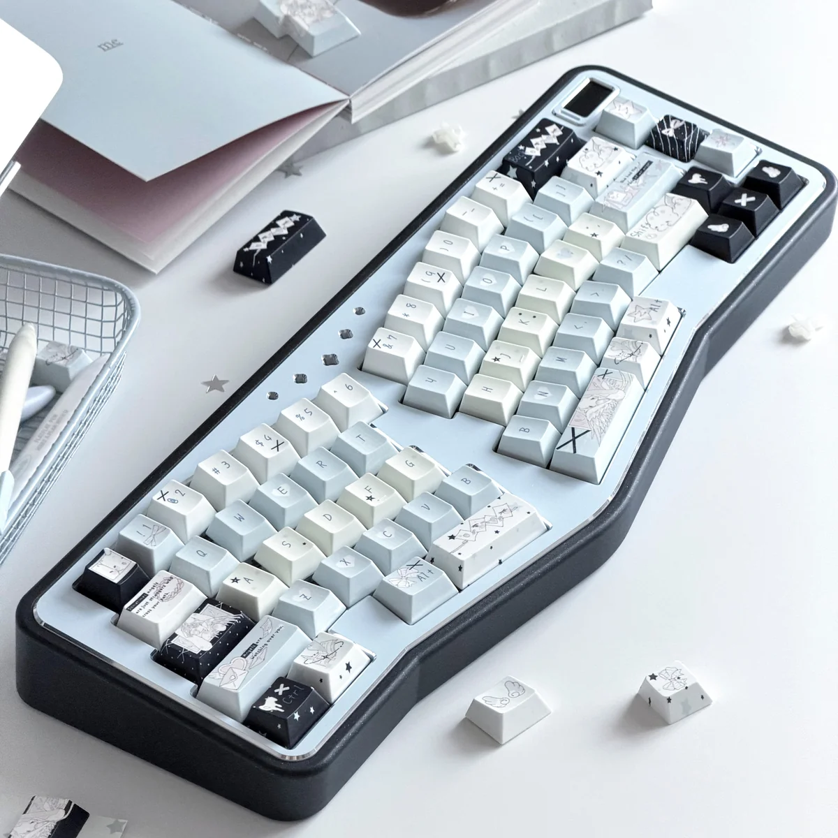 Fake Angel PBT dye-sub keycaps set, showcasing whimsical angelic designs with soft yet striking colors. A unique, artistic keyboard set.